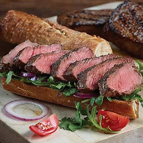 Delicious Boneless Top Sirloin Sandwich Steaks, 12 count, 4 oz each, aged up to 28 days. These restaurant-quality steaks come with cooking instructions from the Kansas City Steak Company.