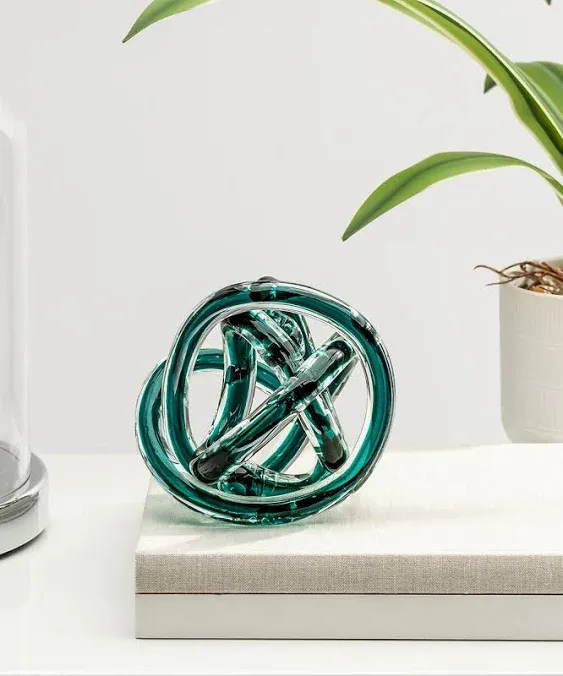 Torre & Tagus Orbit Hand Blown Glass Infinity Knot Sculpture - 4.5 Inch Glass Art Teal Knot Decor Ball for Home Decor, Small Centerpiece Table Decoration for Home Interior (Clear Teal)