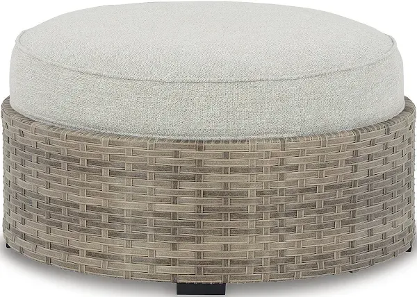 Ottoman With  Cushion - Tropical - Outdoor Footstools And Ottomans - by Ashley Furniture Industries | Houzz