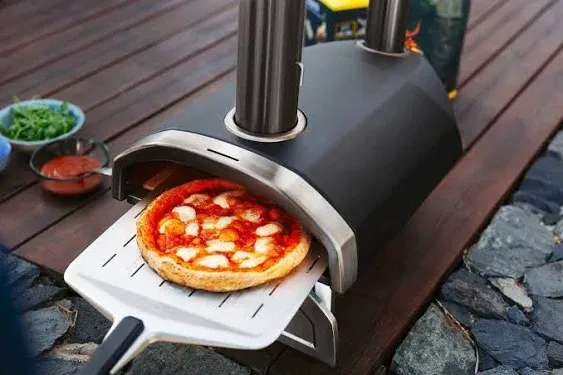 ooni Fyra 12 Wood Fired Outdoor Pizza Oven - Portable Hard Wood Pellet Pizza Oven - Ideal for Any Outdoor Kitchen - Outdoor Cooking Pizza Maker - Backyard Pizza Ovens - Pizza Oven Countertop